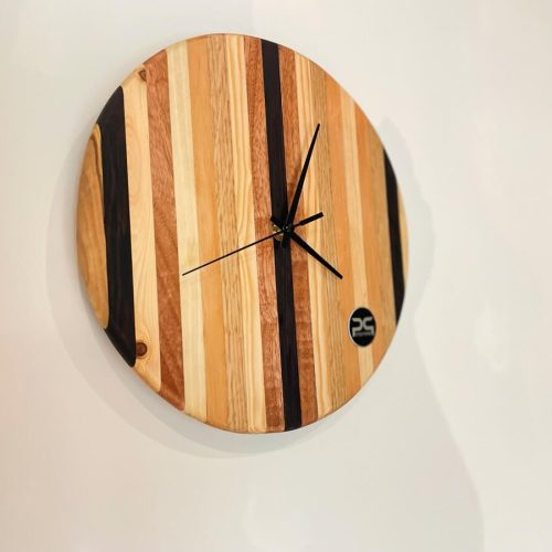 Orologio da parete in legno di varie essenze